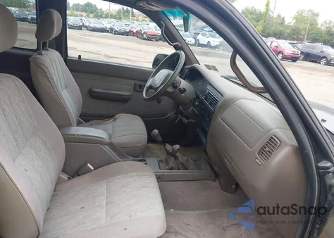 1999 Toyota Tacoma from USA, damaged, VIN 4TAWM72N1XZ537364